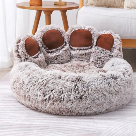 Cama para perros pequeños con forma de pata de oso